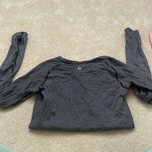 Swiftly Tech Long-Sleeve Shirt 2.0
Waist Length